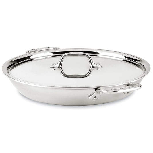 Stainless steel frying pan with lid on a white background