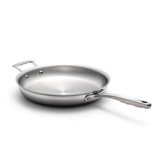 Stainless steel frying pan on a white background