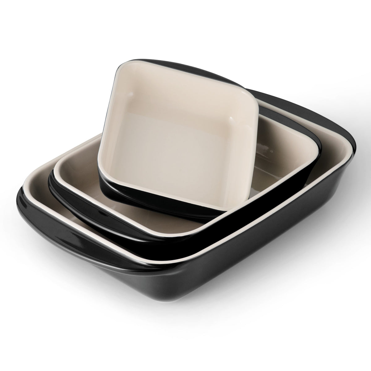 Set of three ceramic dishes with black rims on a white background