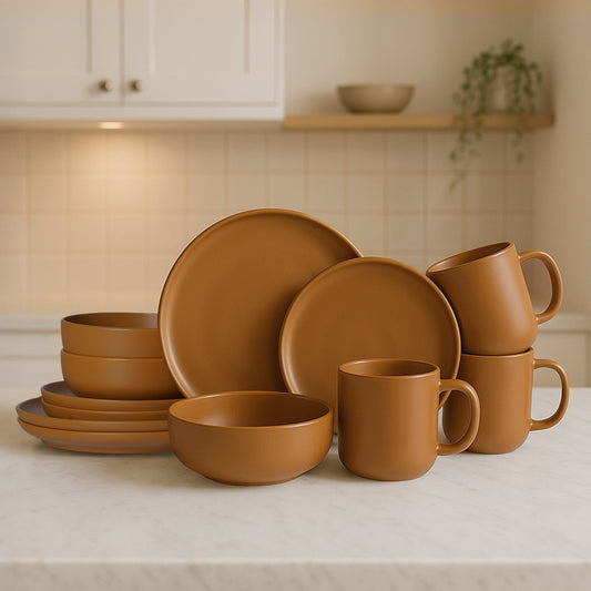 Brown ceramic dinnerware set on a kitchen counter