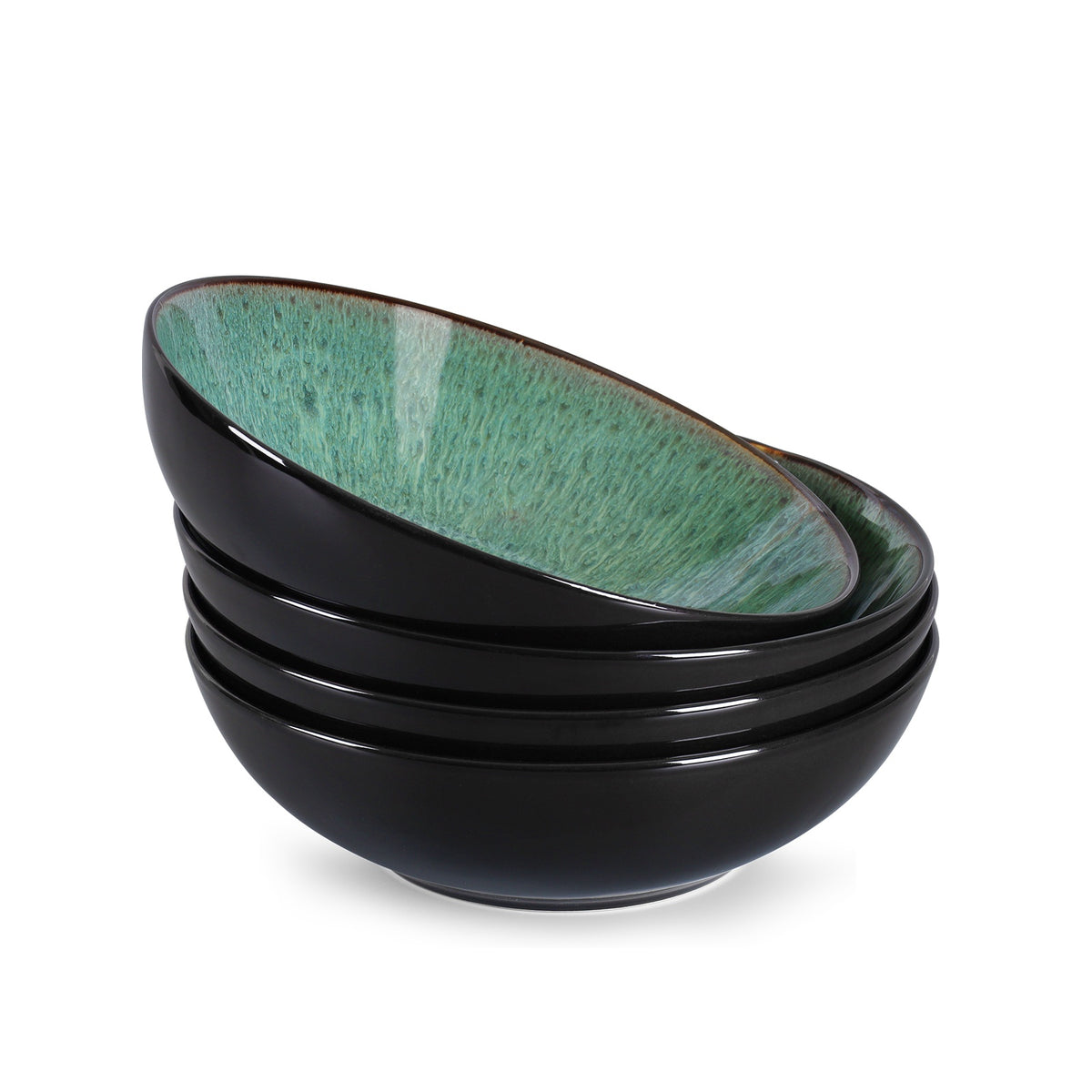 Set of four black ceramic bowls with green interior on a white background