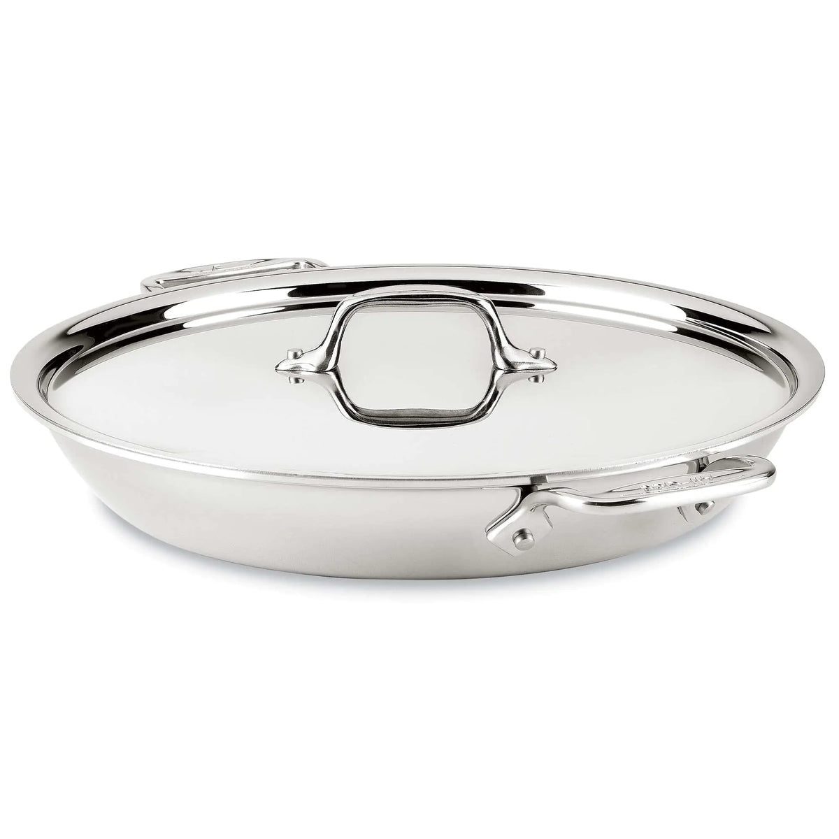 Stainless steel frying pan with lid on a white background