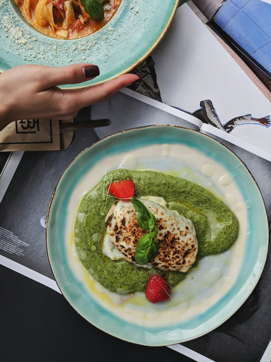 green and white ceramic plate