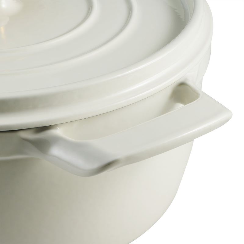 Close-up of a white ceramic pot with lid on a white background