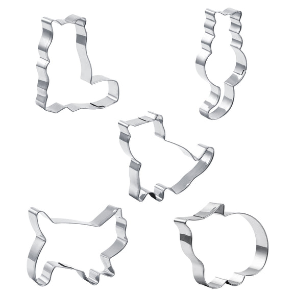 Set of five metal cookie cutters with various shapes on a white background