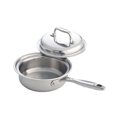 Stainless steel saucepan with lid on a white background