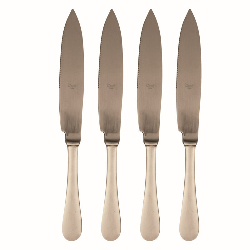 Four rose gold knives with a textured blade on a white background