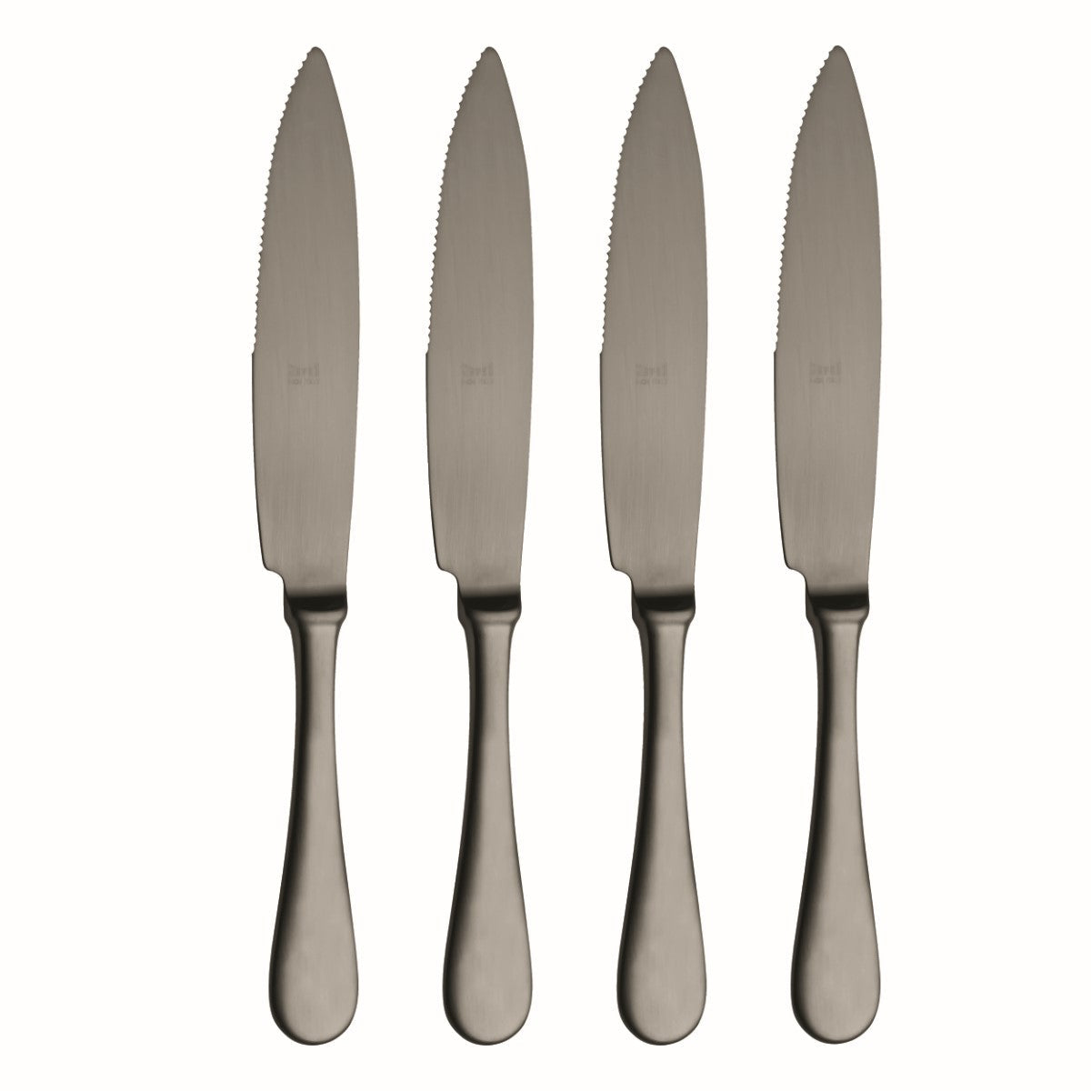 Four silver steak knives with serrated blades on a white background