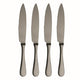 Four silver steak knives with serrated blades on a white background