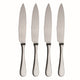 Four silver steak knives with serrated blades on a white background