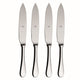 Set of four silver steak knives on a white background
