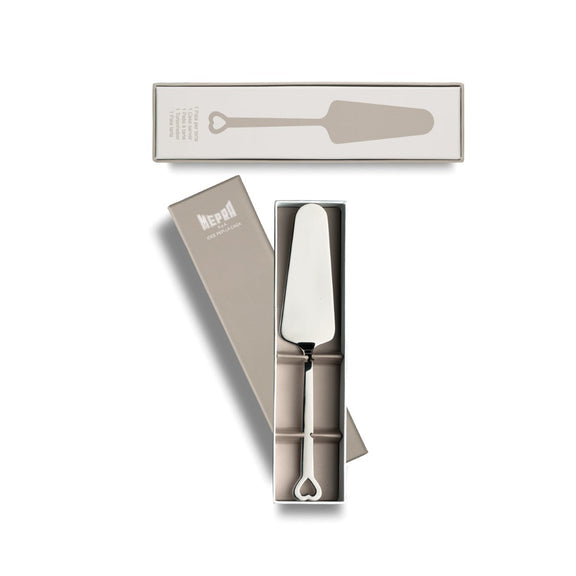 Set of kitchen utensils including a spatula and a knife in a branded box on a white background