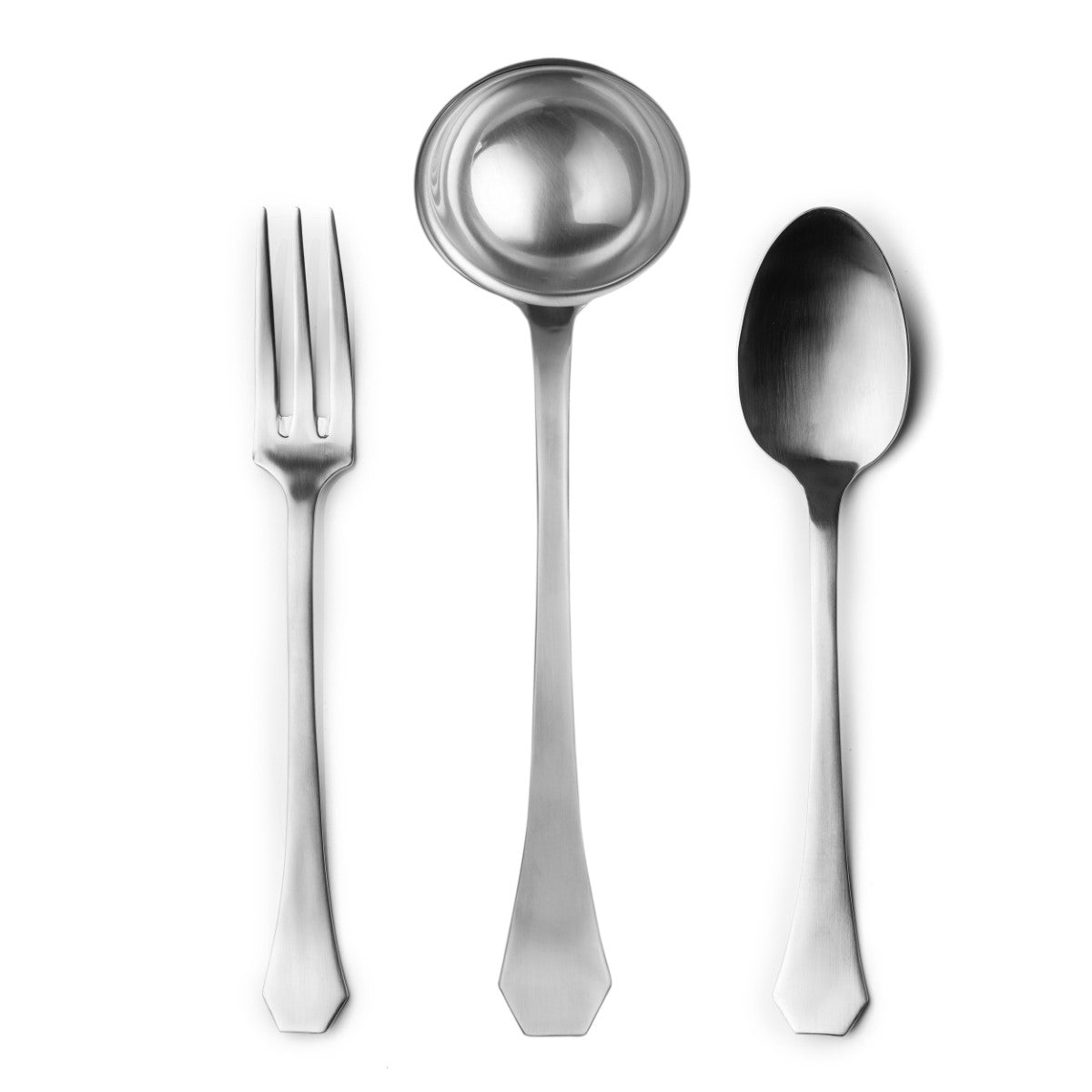 Set of silver cutlery including a fork, ladle, and spoon on a white background