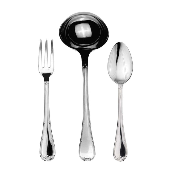Set of silver cutlery including a fork, ladle, and spoon on a white background