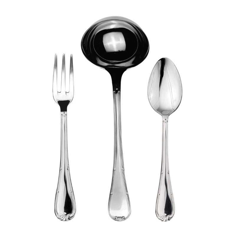Set of silver cutlery including a fork, ladle, and spoon on a white background