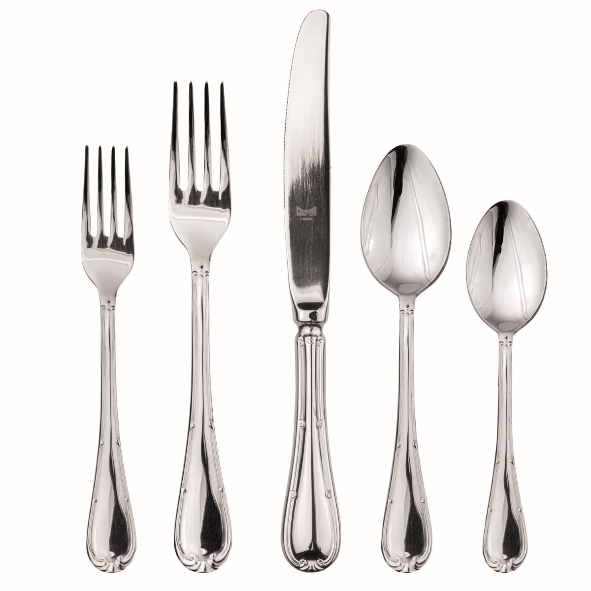 Set of silver cutlery including forks and spoons on a white background