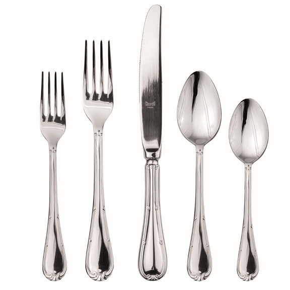 Set of silver cutlery including forks and spoons on a white background