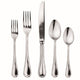 Set of silver cutlery including forks and spoons on a white background