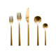 Set of gold-colored cutlery including forks, knives, and spoons on a white background