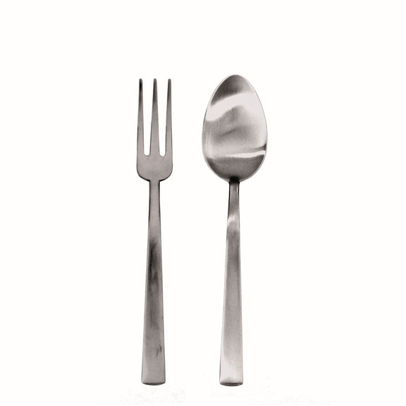 Stainless steel fork and spoon on a white background
