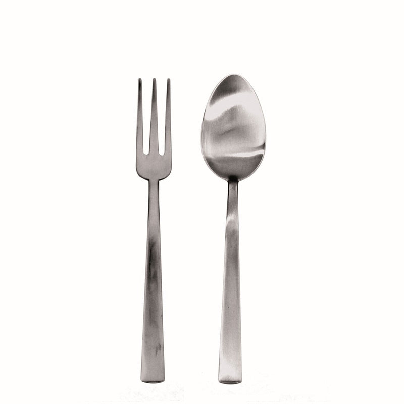 Stainless steel fork and spoon on a white background