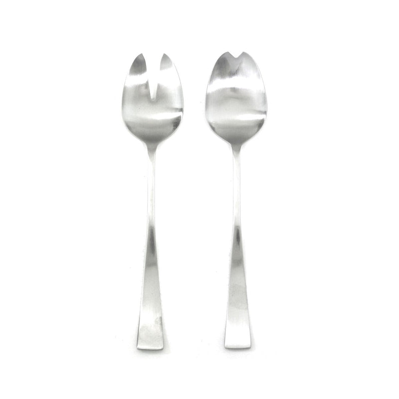 Two silver salad servers on a white background