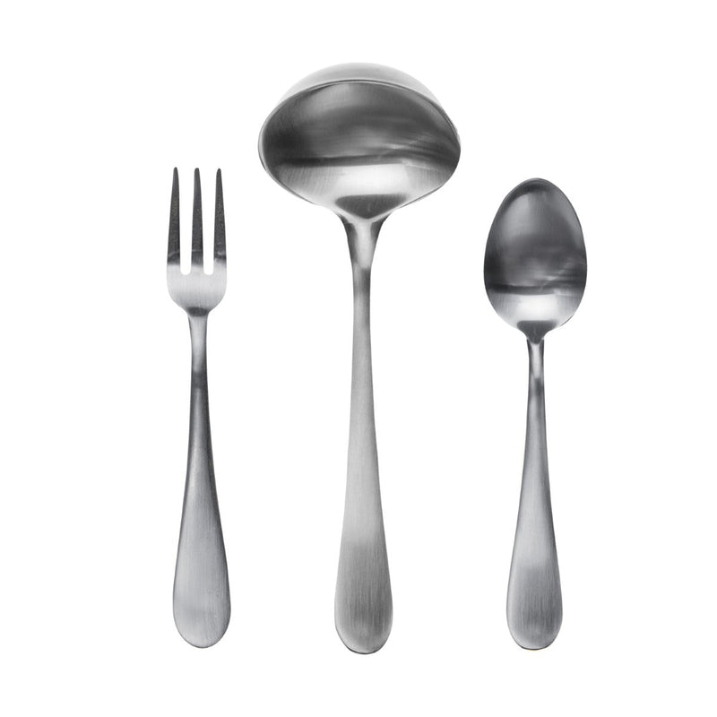 Set of silver utensils including a fork, ladle, and spoon on a white background