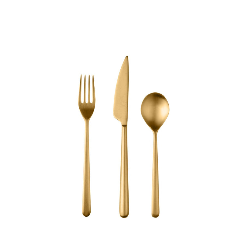 Set of gold cutlery including a fork, knife, and spoon on a white background
