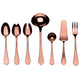 Rose gold flatware set on a white background