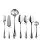 Set of silver cutlery including a fork, knife, ladle, and spoons on a white background