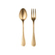 Gold spoon and fork set on a white background