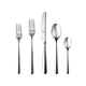 Set of silver cutlery including forks and knives on a white background
