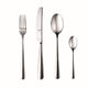 Set of silver cutlery including a fork, knife, and two spoons on a white background.