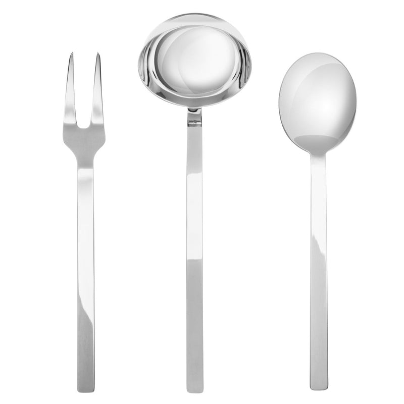 Set of silver cutlery including a fork, ladle, and spoon on a white background