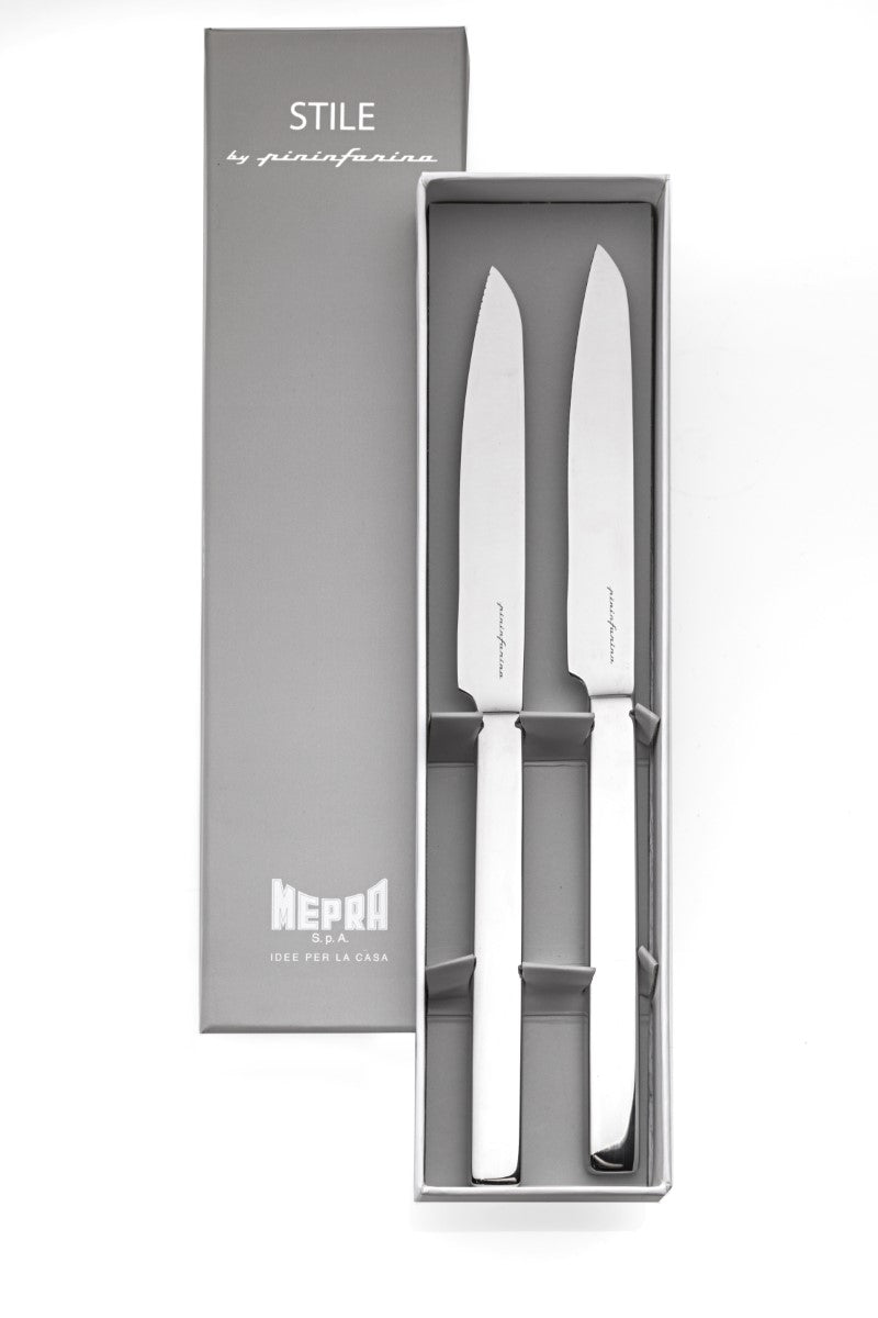 Two knives in a gray box with 'Nepos' branding on a white background