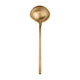 Gold spoon on a white background