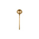 Gold spoon on a white background