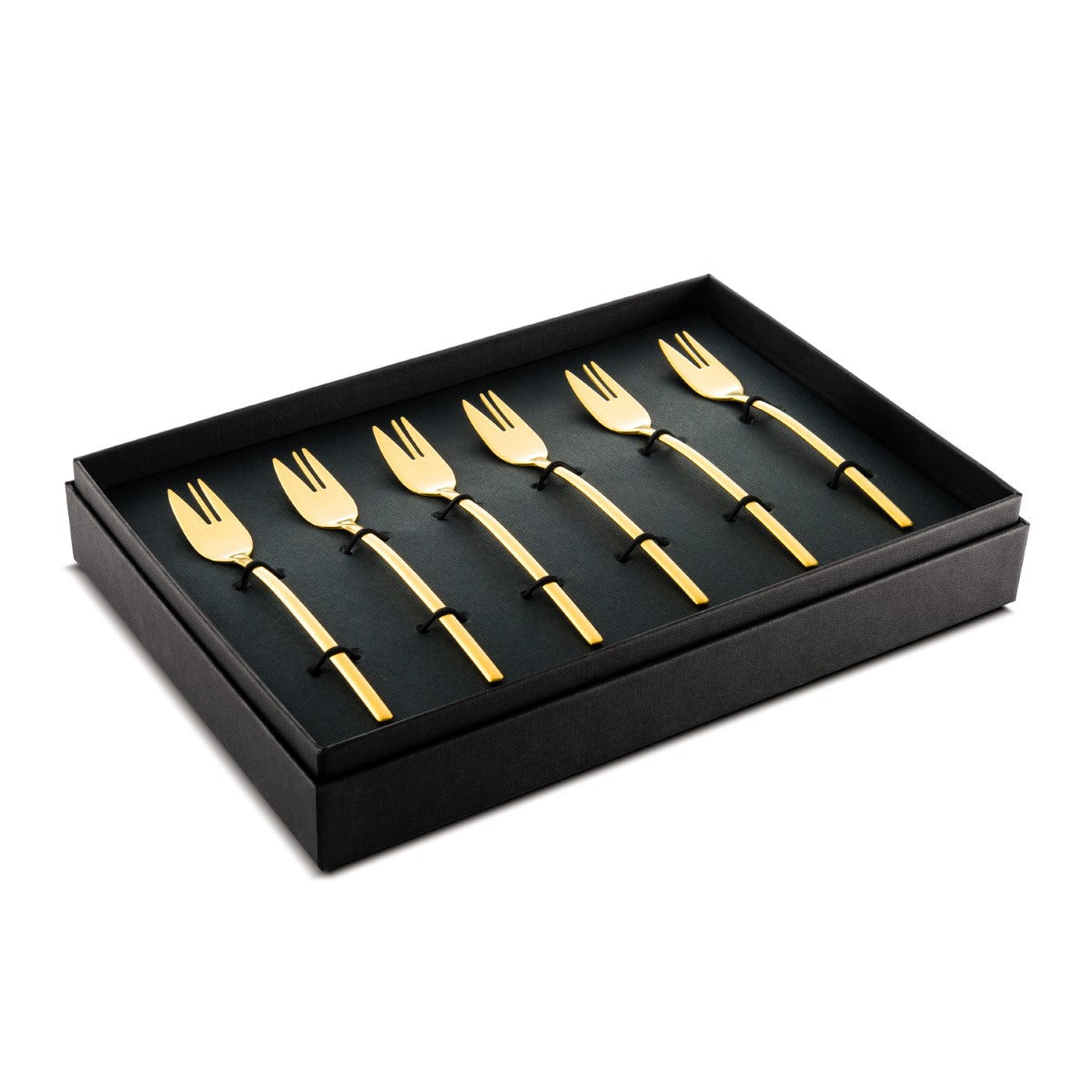 Set of six gold dessert forks in a black box on a white background