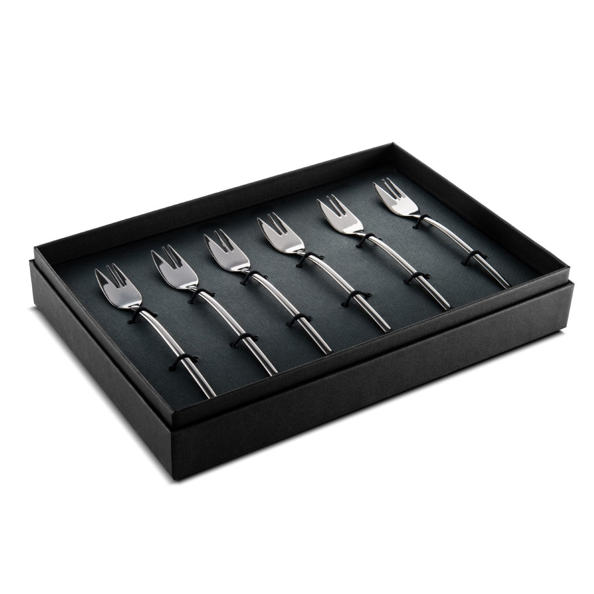 Set of six silver dessert forks in a black box on a white background