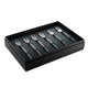 Set of six silver dessert forks in a black box on a white background