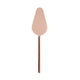 Rose gold cake server on a white background