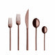 Set of rose gold cutlery including knife, fork, and spoons on a white background