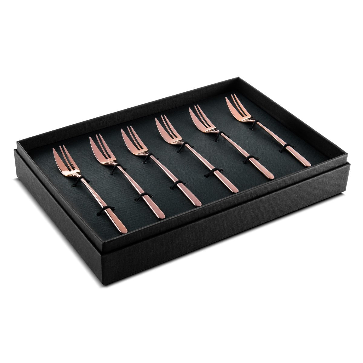 Set of rose gold forks in a black box on a white background