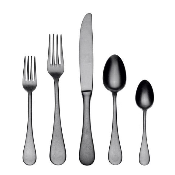 Set of silver cutlery including two forks, a knife, and two spoons on a white background