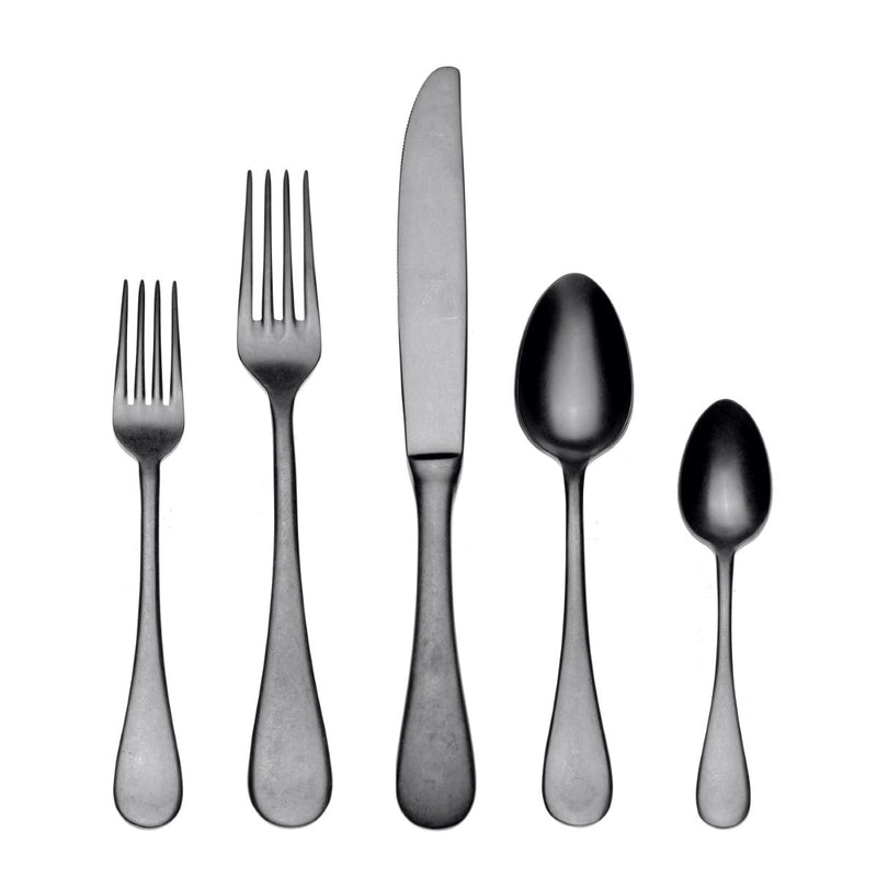 Set of silver cutlery including two forks, a knife, and two spoons on a white background