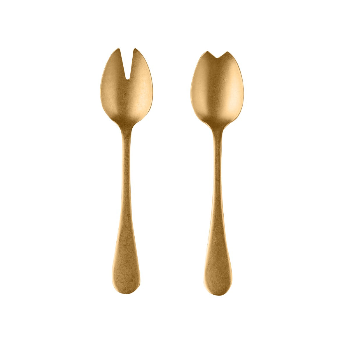 Two gold-colored salad servers on a white background
