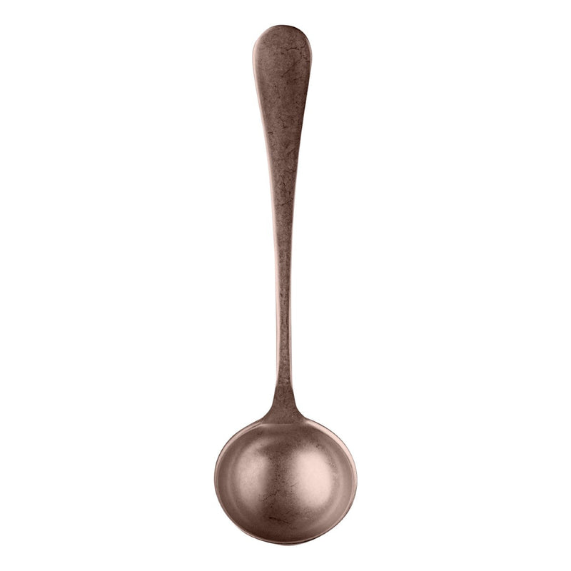 Bronze spoon on a white background