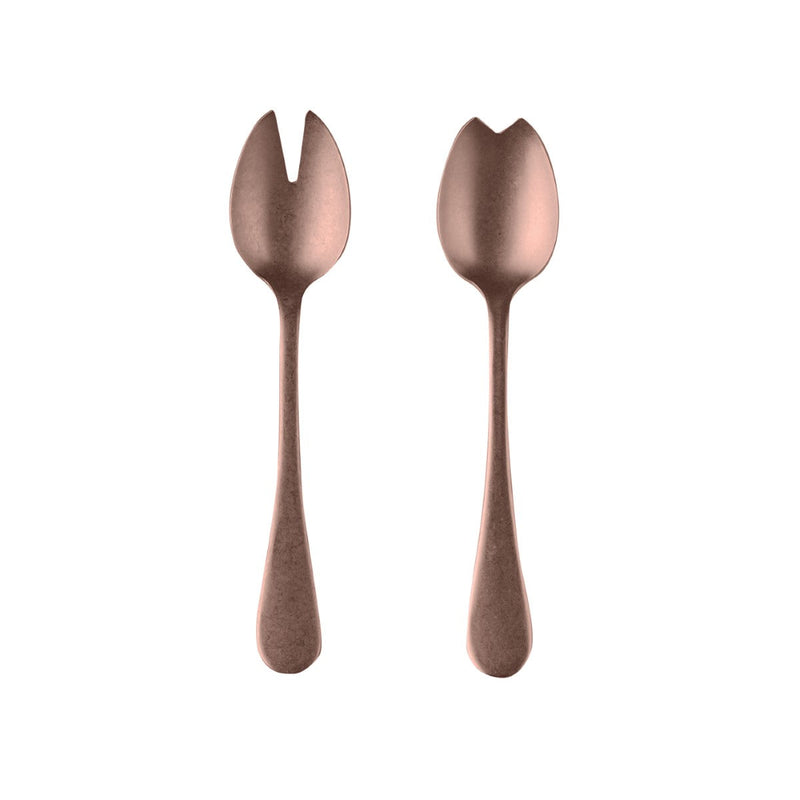 Pair of rose gold salad servers on a white background