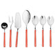 Set of silver cutlery with coral handles on a white background