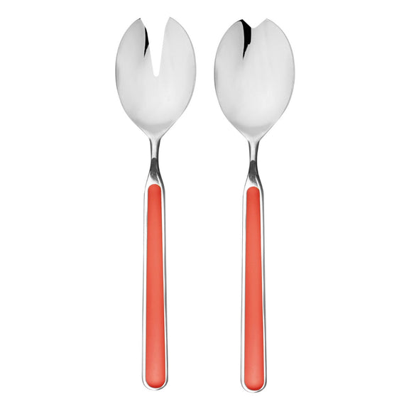 Two silver spoons with coral handles on a white background